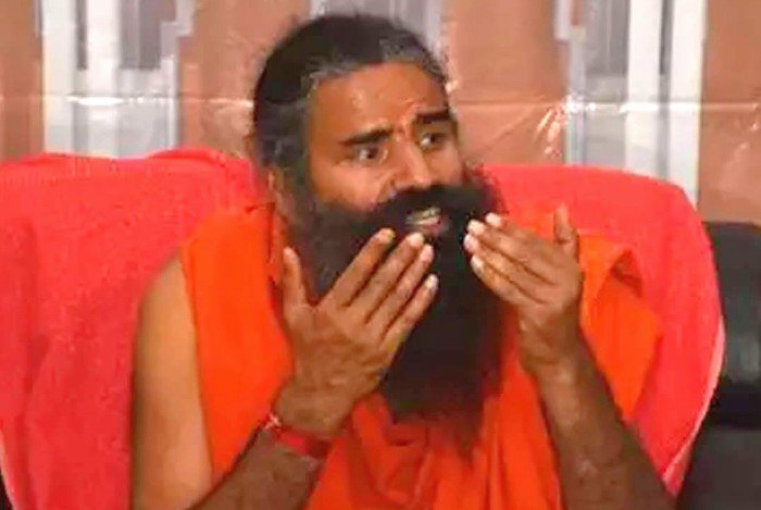 Baba Ramdev apologizes after backlash for comment about women looking good without clothes