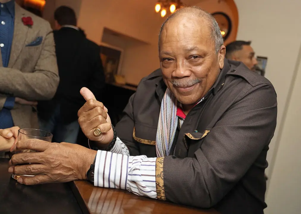 Quincy Jones' family strikes a monumental deal, selling his catalog rights for an astounding sum of $300–$500 million.
